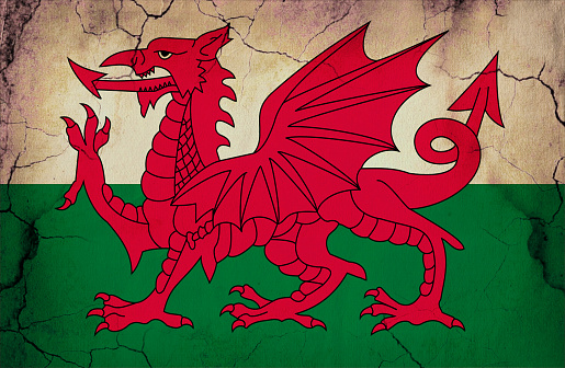 Welsh flag in grunge and vintage style.