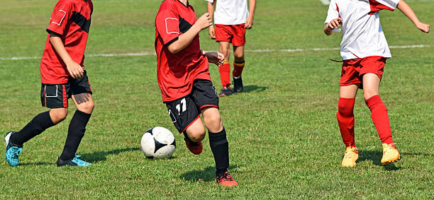 istock Kids are playing soccer 515002608