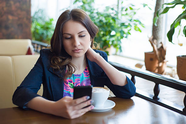 istock beautiful young girl drinking coffee 515003560