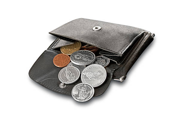 Purse Purse filled with euro and Swiss coins swiss coin stock pictures, royalty-free photos & images
