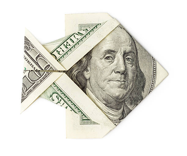 istock Hundred dollars origami fish isolated 515004970