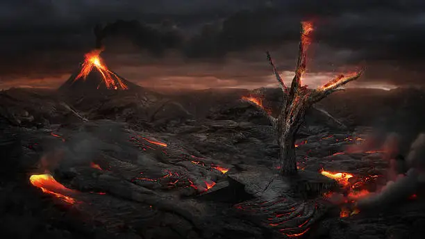 Burning tree in the landscape after a volcanic eruption