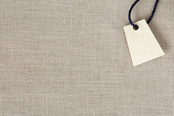 istock Light grey Fabric Background and blank Price Tag 515006248
