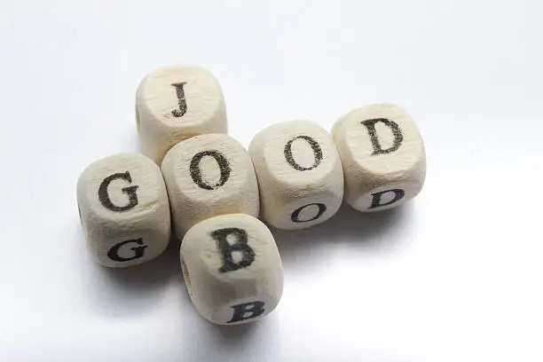 Photo of GOOD JOB text on a wooden cubes