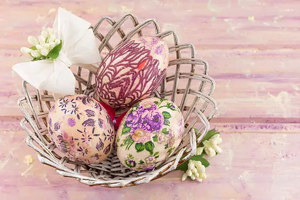 Photo of Decorated Easter eggs in a basket