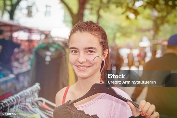 Smiling Woman On A Flea Market Stock Photo - Download Image Now - Flea Market, Clothes Rack, Garage Sale