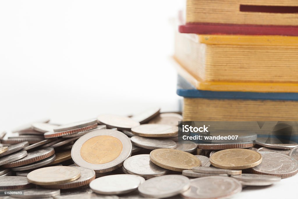 thai coin and money box thai coin and money box  on white paper background Banking Stock Photo