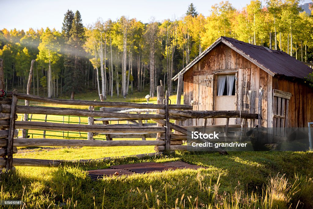 Log Cabin in Autumn Log cabin in southwest Colorado in the fall. Aspen Tree Stock Photo