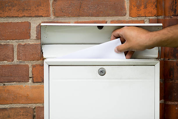 istock White blank Mailbox on the house wall - letter received 515011099
