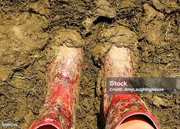 Muddy Wellies Wellington Boots At A Music Festival Stock Photo - Download Image Now - Music Festival, Mud, UK