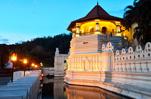 Sri Dalada Maligawa or the Temple of the Sacred Tooth Relic is a Buddhist temple in the city of Kandy, Sri Lanka. According to legend, the tooth was taken from the Buddha as he lay on his funeral pyre.