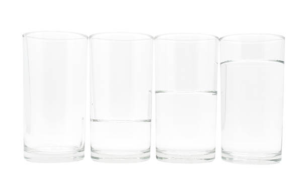istock Four glasses with three level of water 515012319