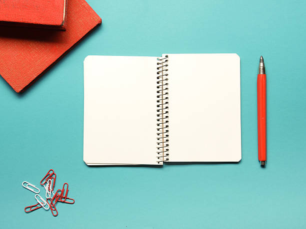 istock Office desk table with supplies and crumpled paper. Top view 515012420