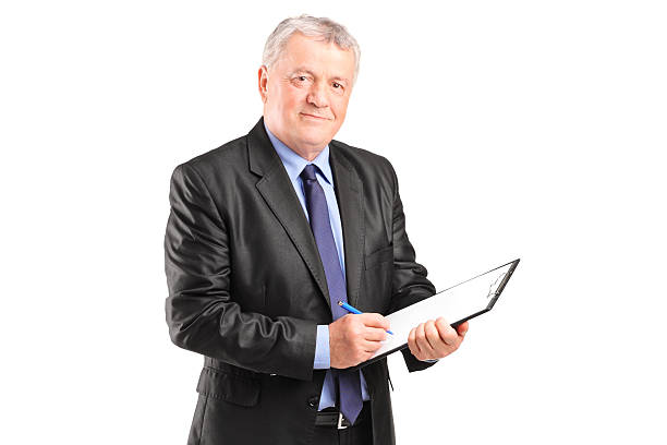 istock Mature businessman taking notes on piece of paper 515012571