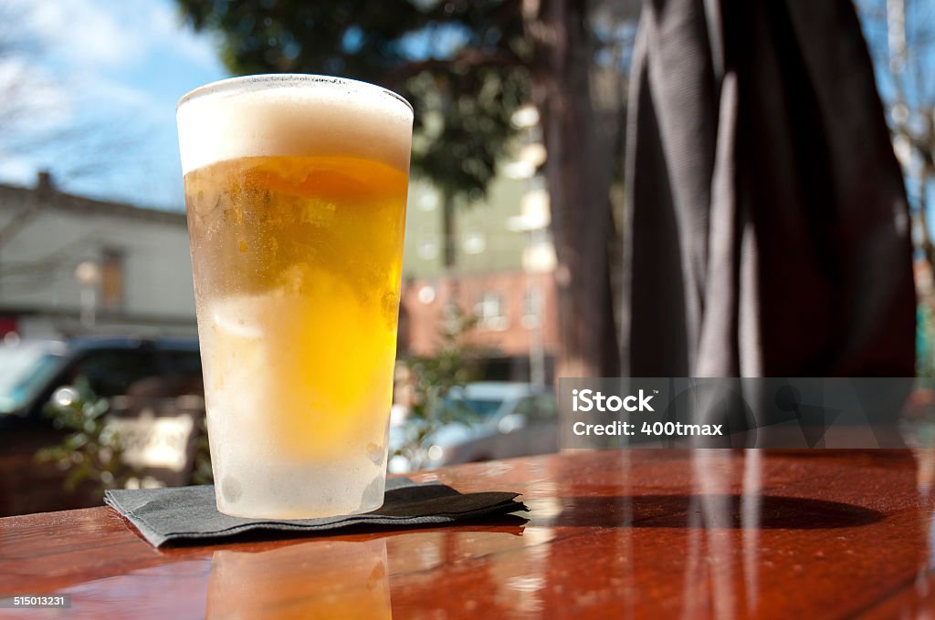 Cold Frosty Beer A cold cold frosty beer on a counter. Alcohol - Drink Stock Photo