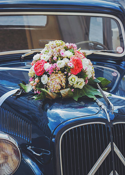 istock Vintage wedding car with flowers 515014757