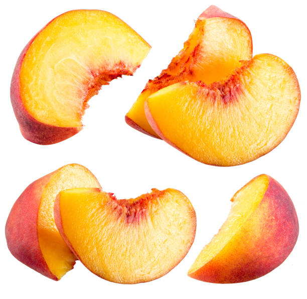 peach scheiben, isoliert auf weißem hintergrund - nectarine stock-fotos und bilder