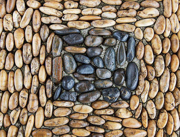 istock Brown and Black Sea stones background on Side walk 515016129