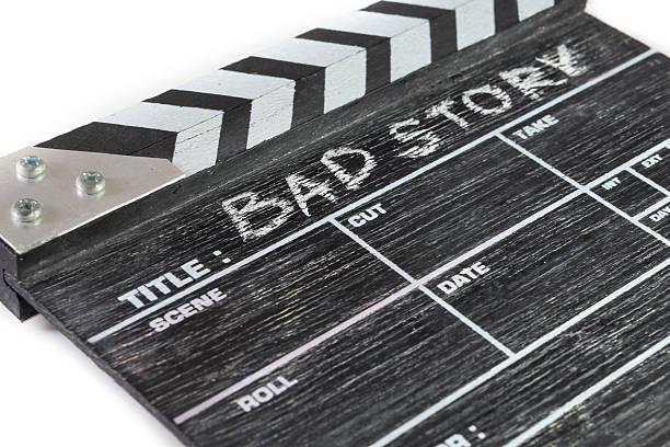 istock wooden clapper board on white background Title Bad story 515047061