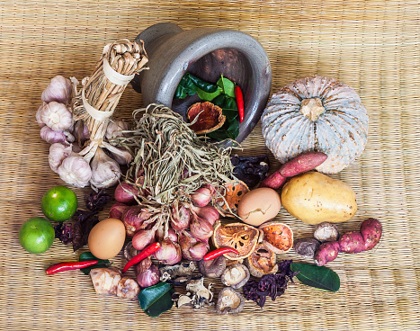 Still life of food,vegetable,dried food and egg  on old mat