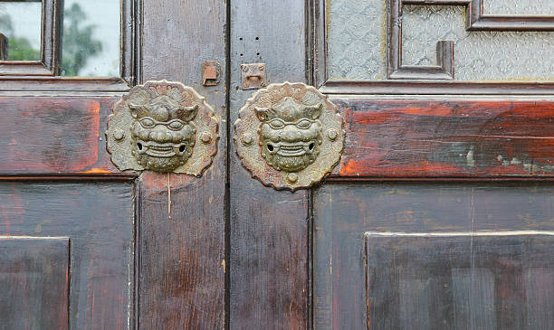 istock chinese old style lion door 515049789
