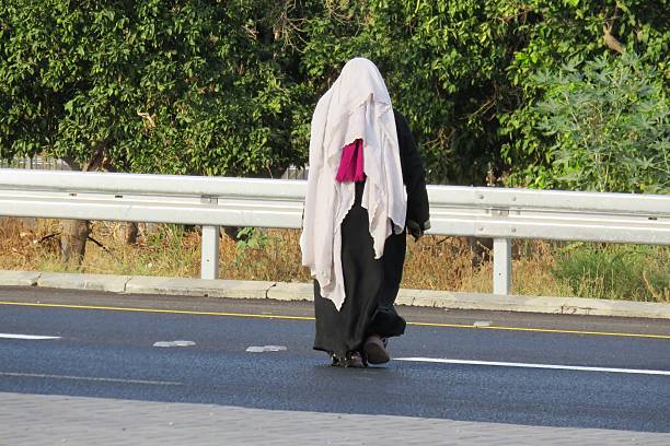 istock woman crossing 515050245
