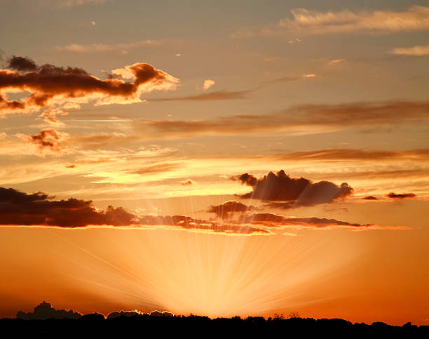istock Colorful sky with clouds in the rays of the setting sun 515053927