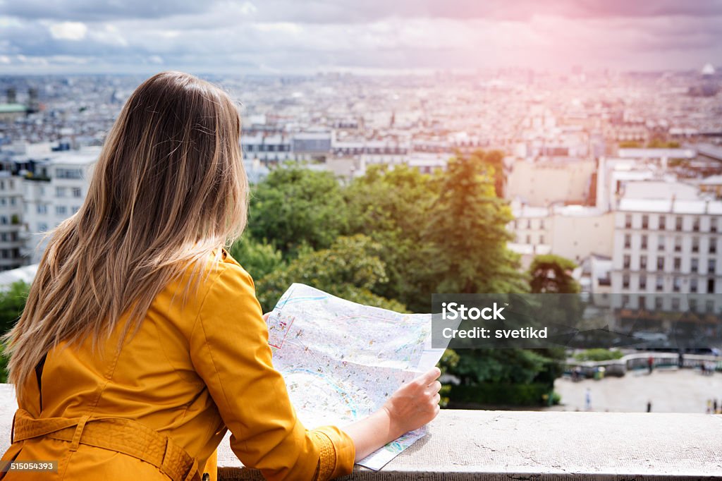 Woman in Paris. Woman  with map at observation point of Sacred Heart Basilica, Paris, France. One Woman Only Stock Photo