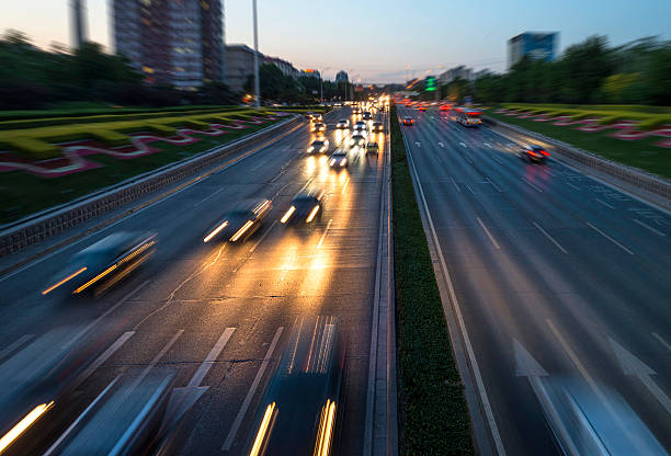 istock Urban highway traffic at night 515054409