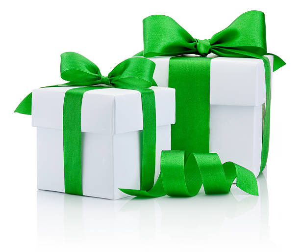 istock Two White boxs tied green ribbon bow Isolated on white 515054481