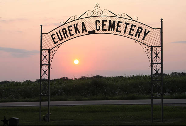 istock Sunset Through The Eureka Cemetery Sign 515054509