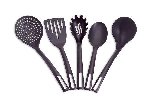 istock Plastic black cooking utensils on a light background 515056160