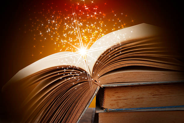 istock Abstract magic book on wooden background 515056262