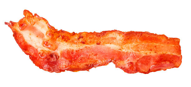 istock Cooked bacon strip close-up isolated on a white background. 515057032