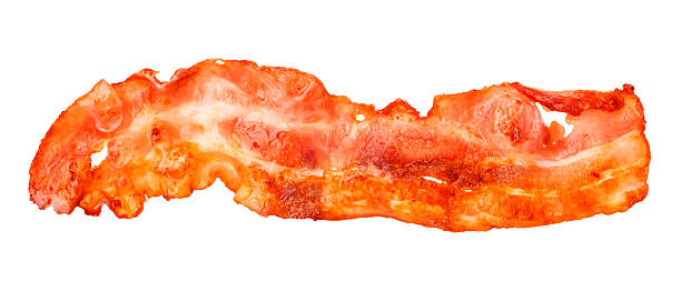 istock Cooked bacon strip close-up isolated on a white background. 515057152