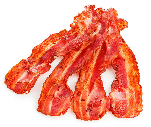 istock Cooked bacon rashers close-up isolated on a white background. 515058270