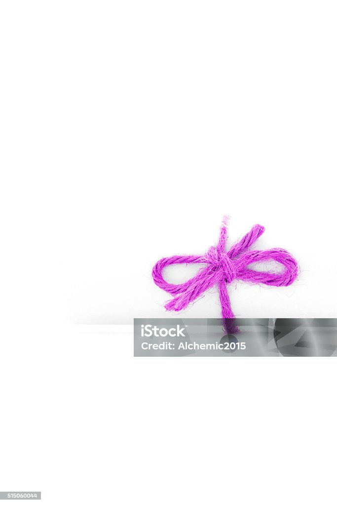 Handmade Pink String Bow Tied On White Message Roll Isolated Stock Photo -  Download Image Now - iStock