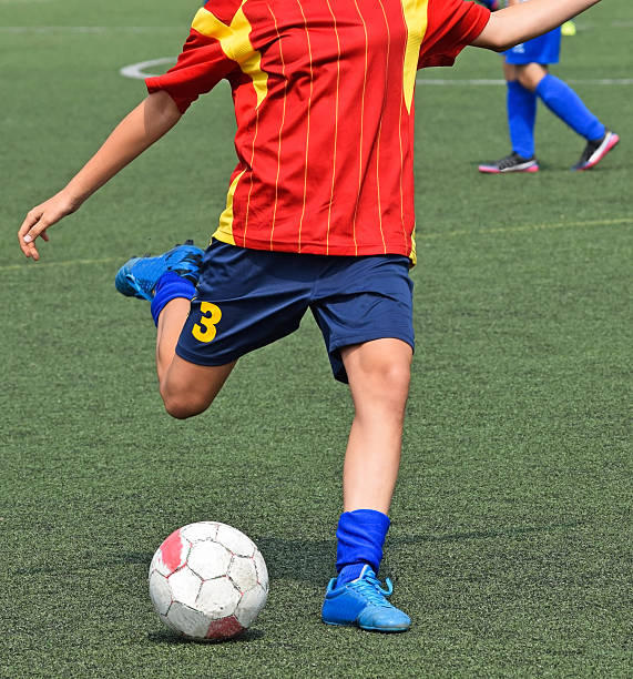 istock Female soccer player kicks a penalty 515060702