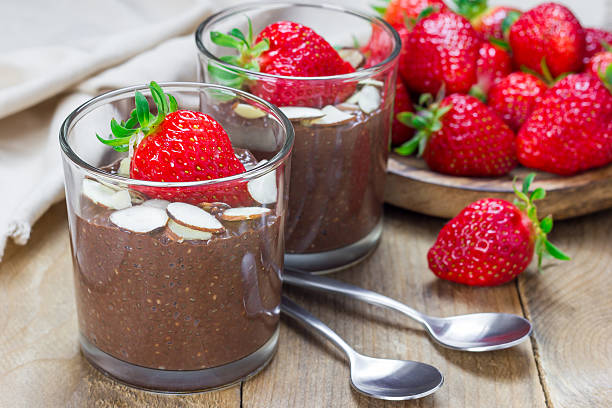 istock Chocolate chia seed pudding garnished with almond slices and strawberry 515065660