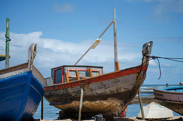 istock fishing boats at the beach 515065829