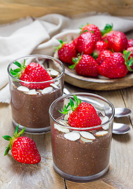 istock Chocolate chia seed pudding garnished with almond slices and strawberry 515065962