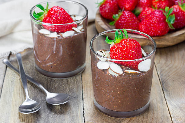 istock Chocolate chia seed pudding garnished with almond slices and strawberry 515065976