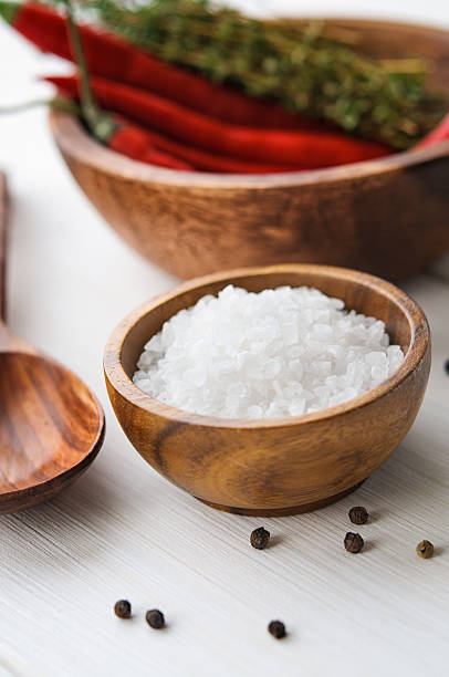 istock Salt, pepper, chili and thyme in bowls on white rustic 515067744