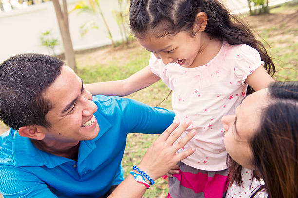 istock Young Thai Family Spending Time in Front of Home 515067879