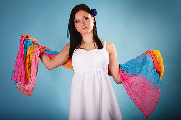 istock summer woman with colored shawl on blue 515068959