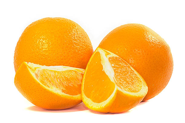 istock two oranges and two orange slices on white background 515070515