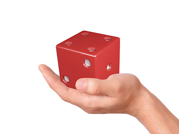 istock hand holding dice isolated on white background 515070641