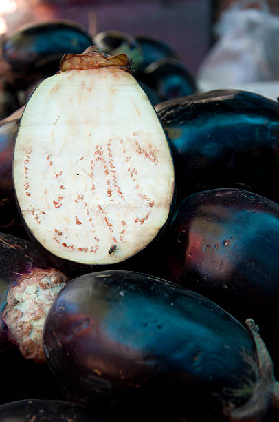 istock cross section big eggplants in open market 515070929
