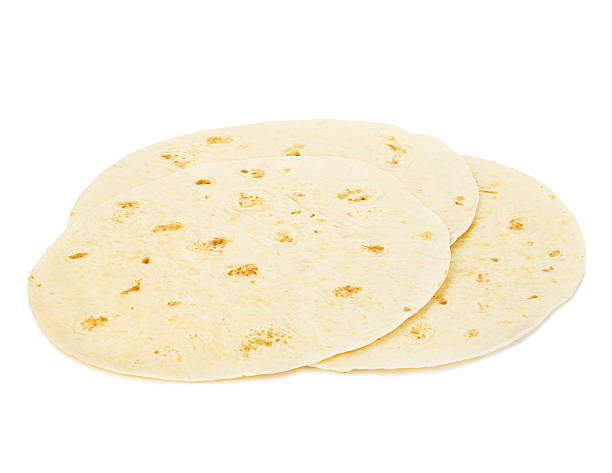 istock Round wheat tortillas close-up isolated on white background. Lavash. 515070938