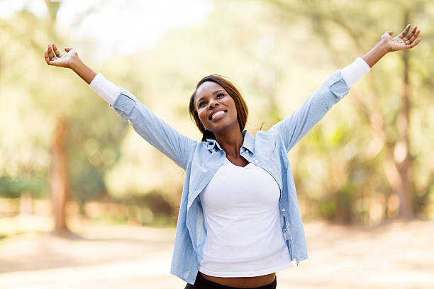 istock african woman with arms outstretched 515071775